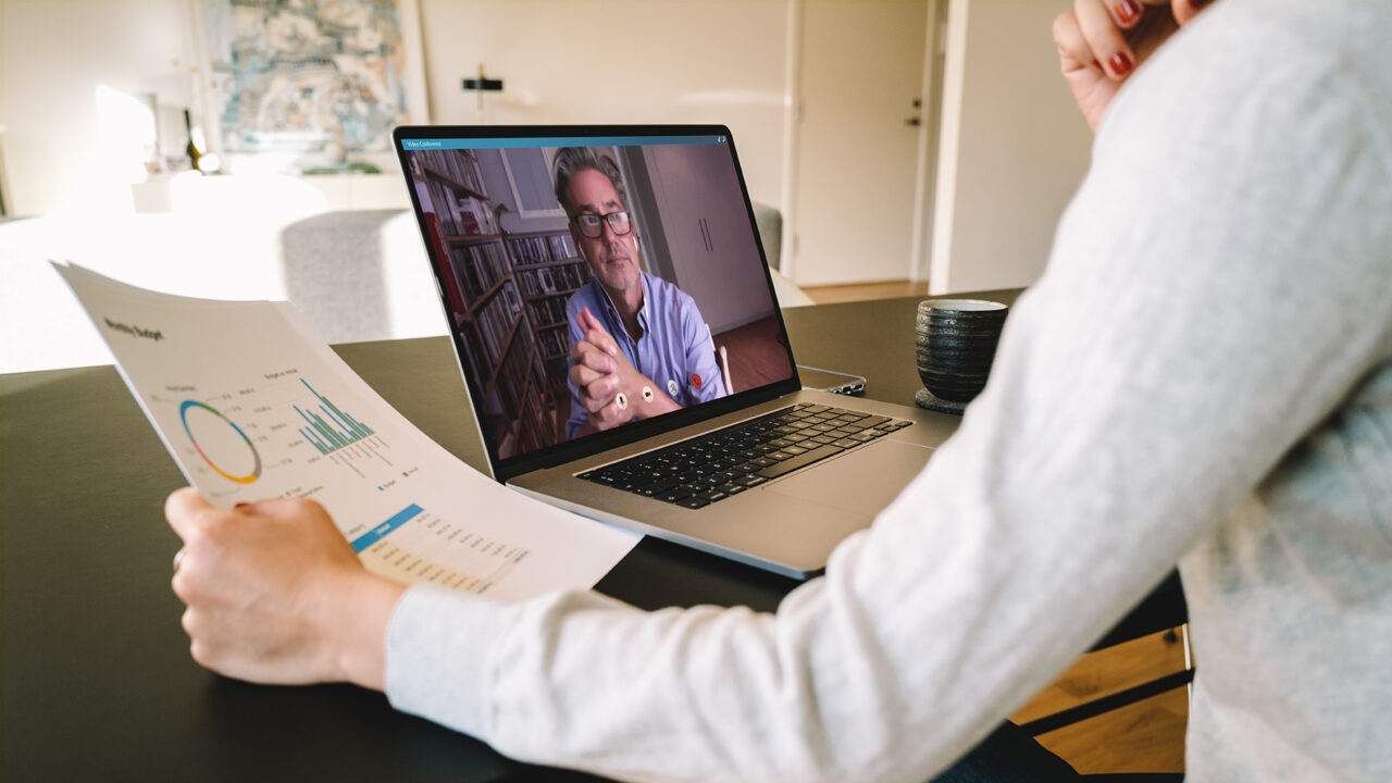 Woman making video call to business partner